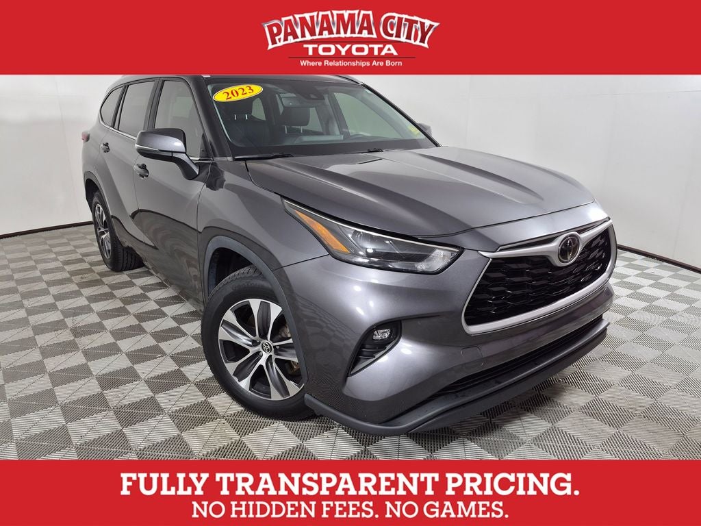 2023 Toyota Highlander XLE in Magnetic Gray Met. — front three-quarter view